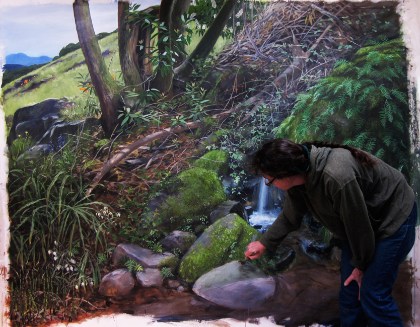 Ali Pearson working on the seasonal spring waterfall mural